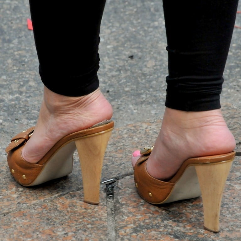 Candid classy mature heels feet image