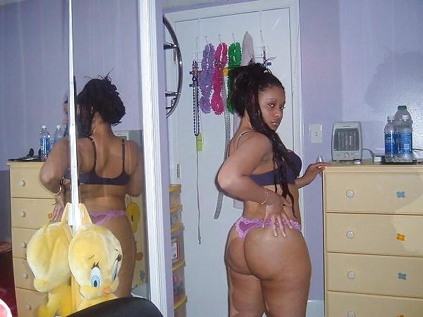 Big Booty Ebony Teen in the Bedroom adult photos