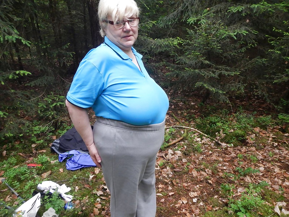 Busty granny in forest adult photos