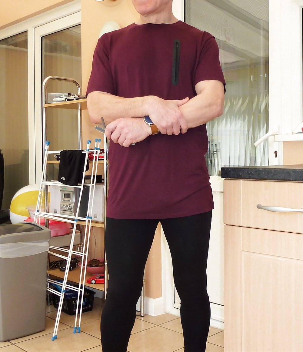 Black leggings and wine coloured top adult photos