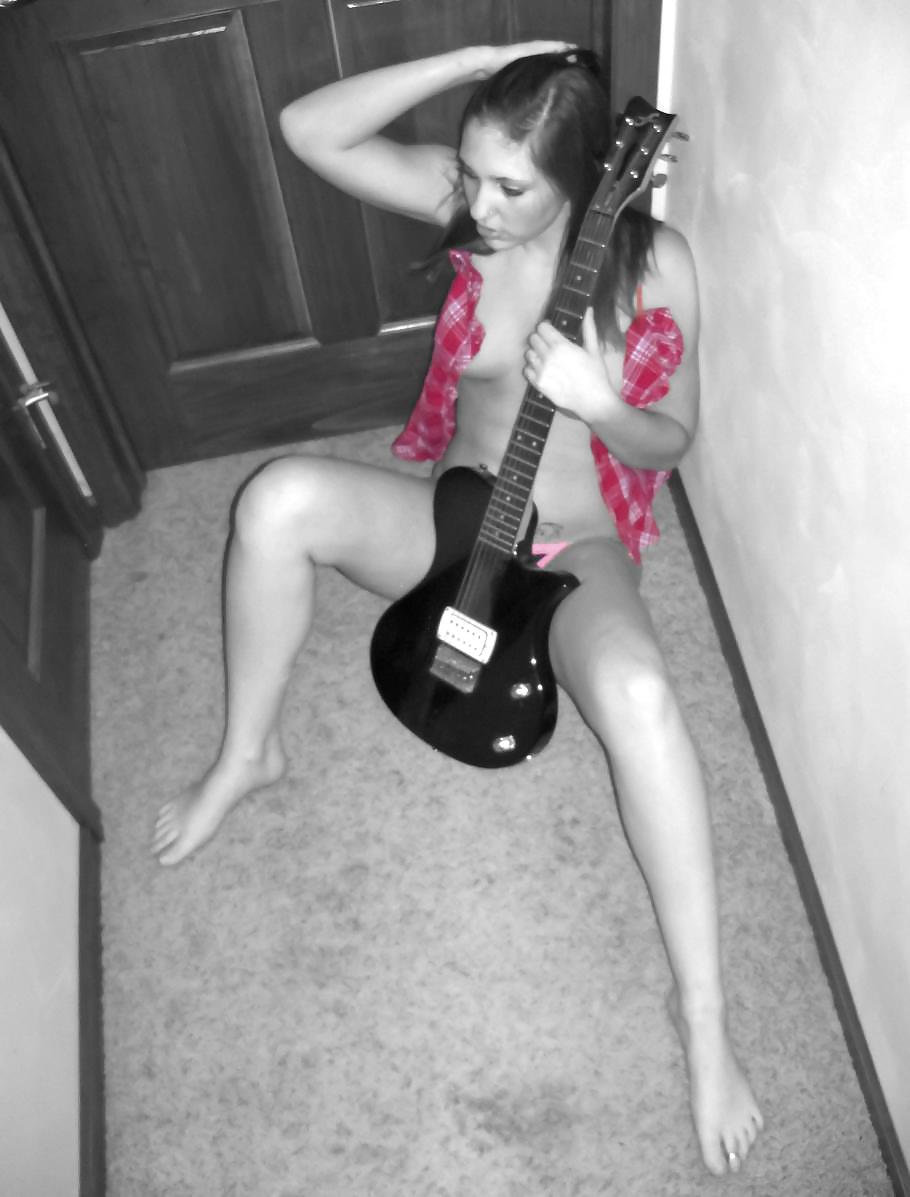 Hot Teen and her Guitar adult photos