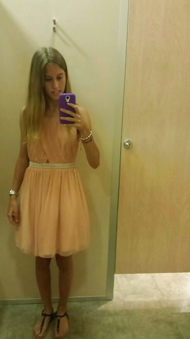 Skinny Teen Strips Showing Her Bush adult photos