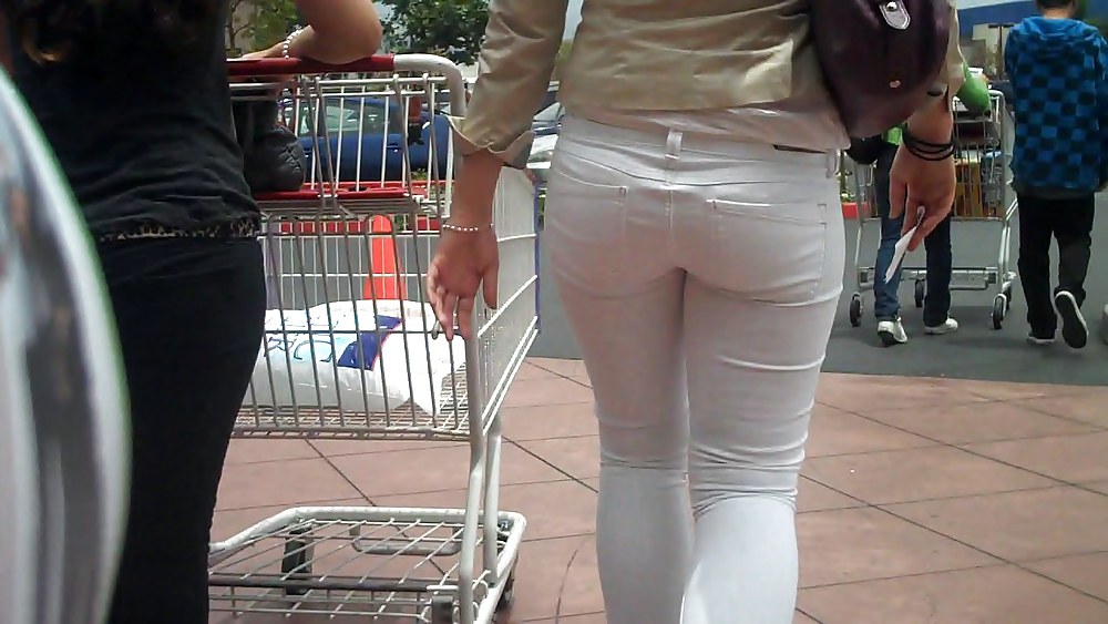 Nice sexy ass & butt in white jeans looking good adult photos