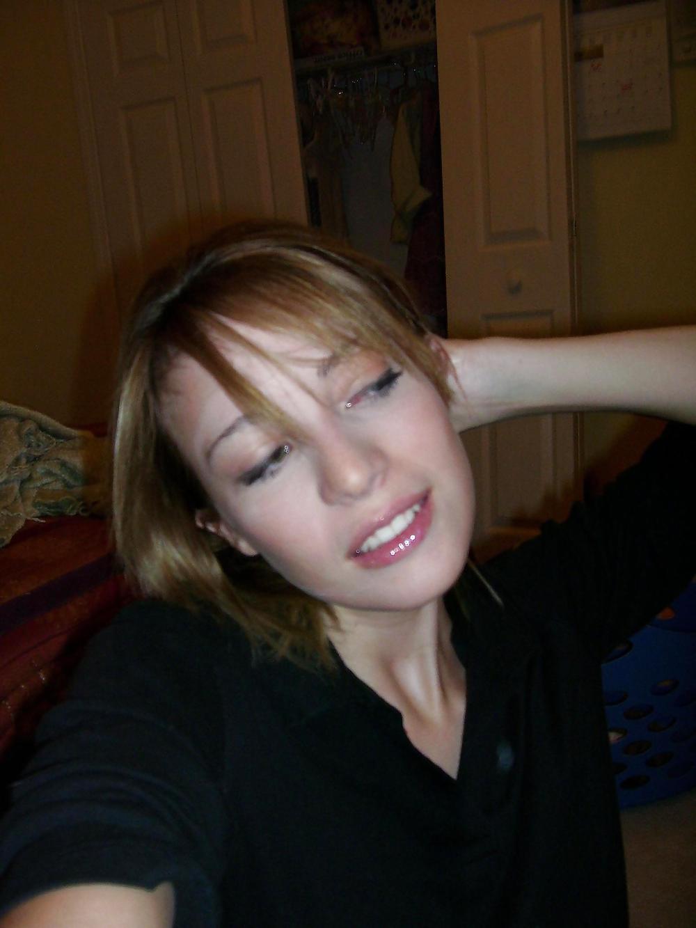 Flawless blonde spreading for the camera adult photos