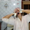 Hot housewife funny Lukerya at home in the kitchen in a bath