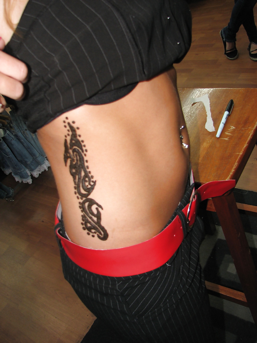 Getting Tattoo adult photos