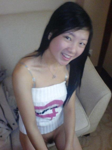 ASIAN DELIGHT adult photos