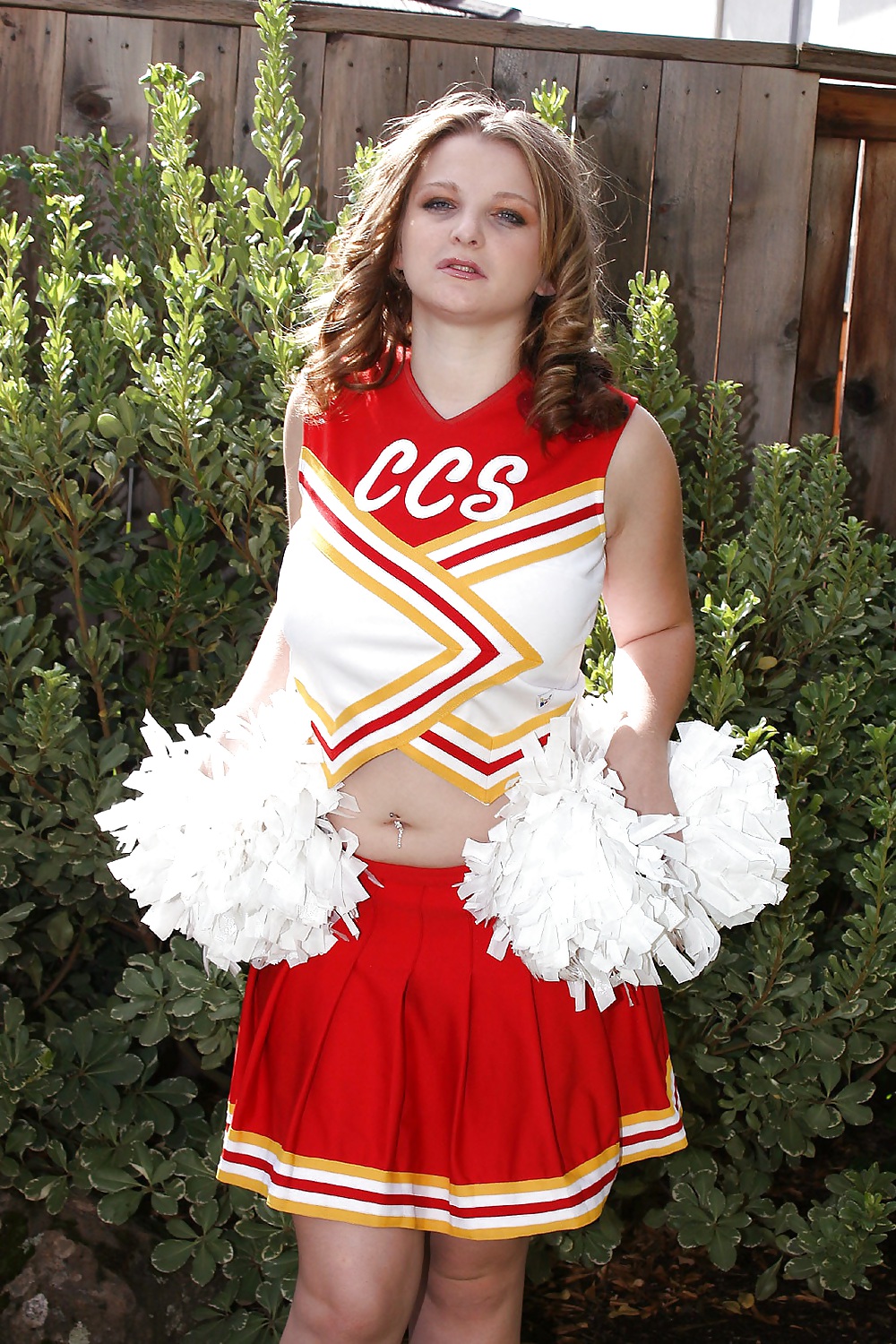 Busty Cheerleader Teaser adult photos