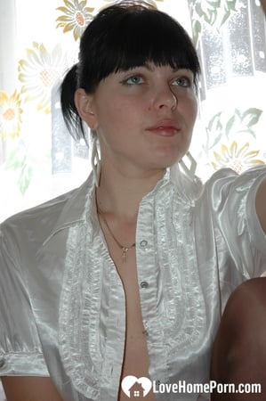 Smoking mom in stockings showing off her legs