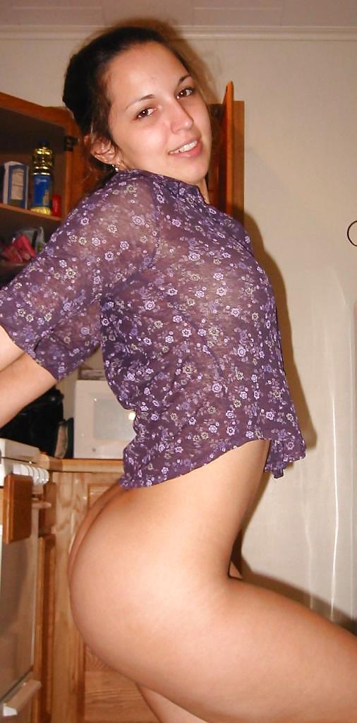 LATINA PLAYING IN KITCHEN adult photos