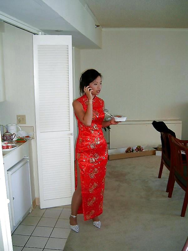 Single Asian girl in Cheongsam adult photos