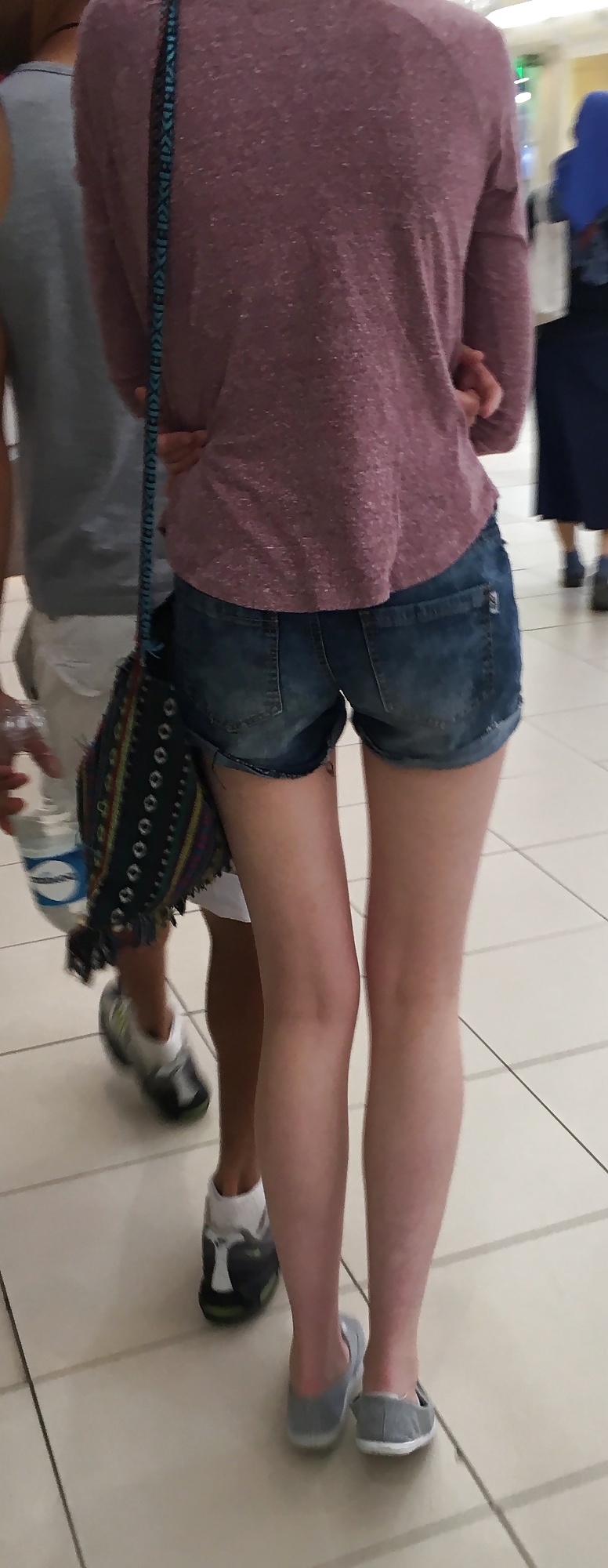 A tall tight mall teen from behind adult photos