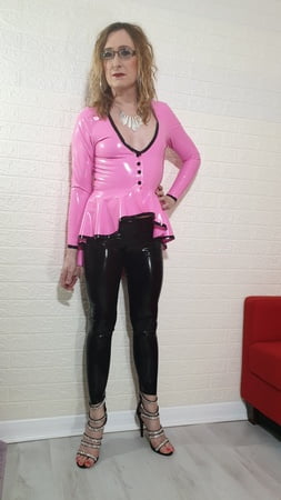 pink riding jacket and black leggings from latex and lovers         