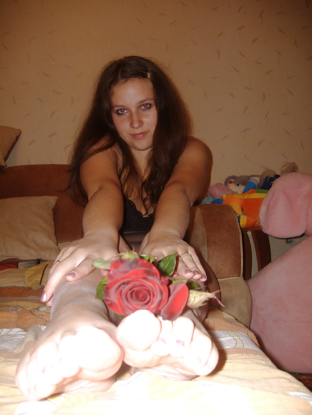 Brunette teen posing with a rose adult photos