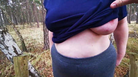 naked on bench in winter titslapping         