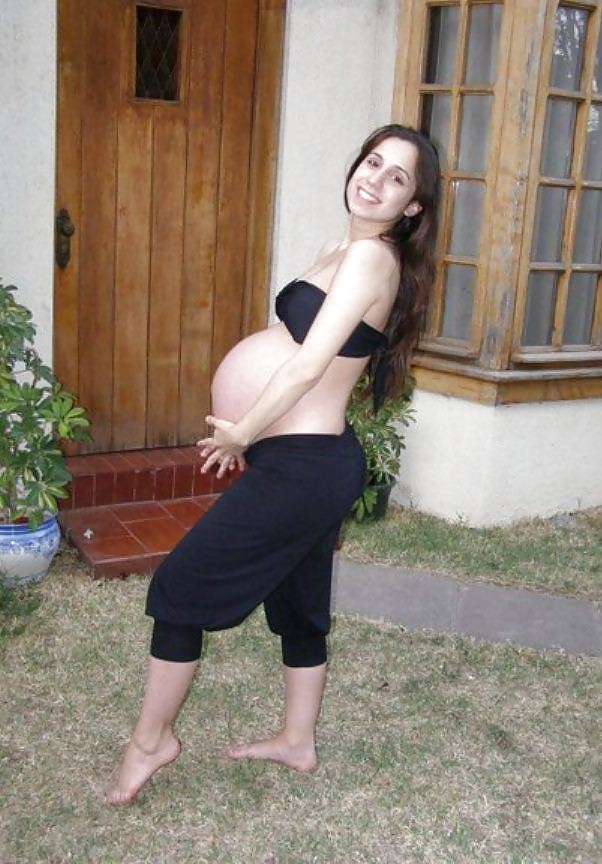 sexy pregnant girls (showing belly) adult photos