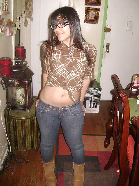 Cute Latina With Ass Wearing Glasses adult photos
