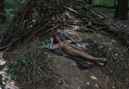 in forest cradle with apple         