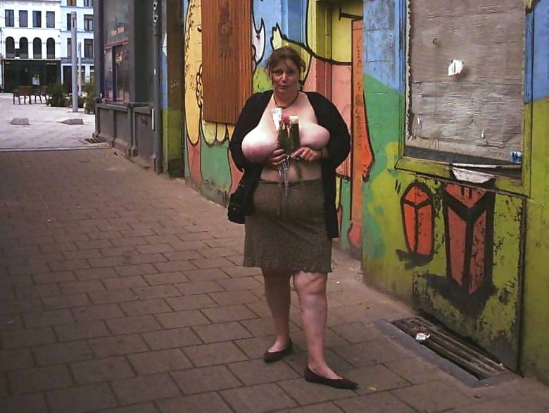 Huge Boobed Milf Posing in Public adult photos