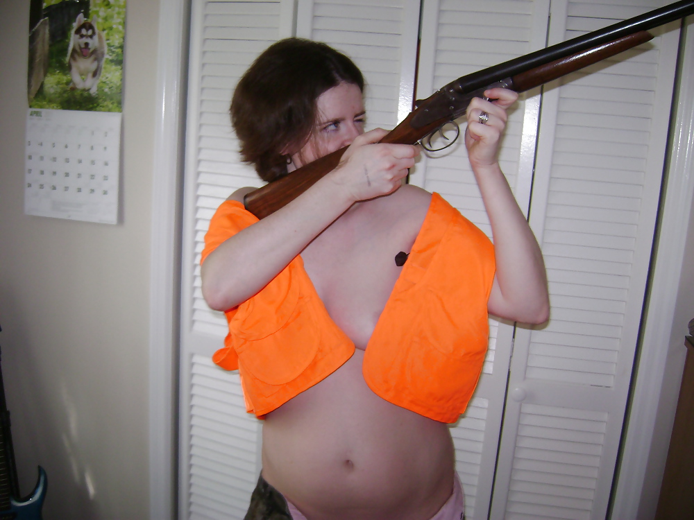 Redneck Girl Shows Her Guns adult photos