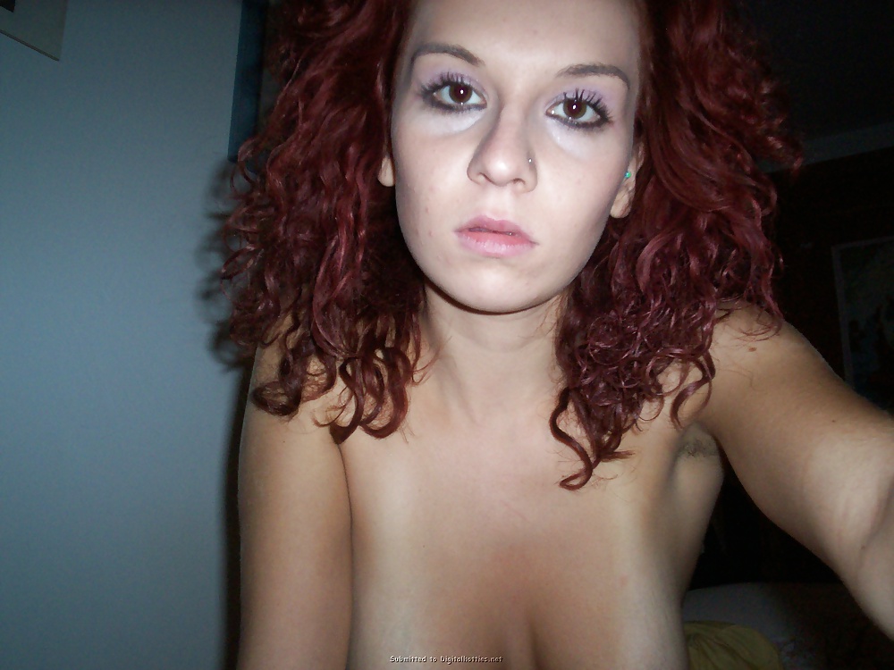 Curly Haired red brunette adult photos