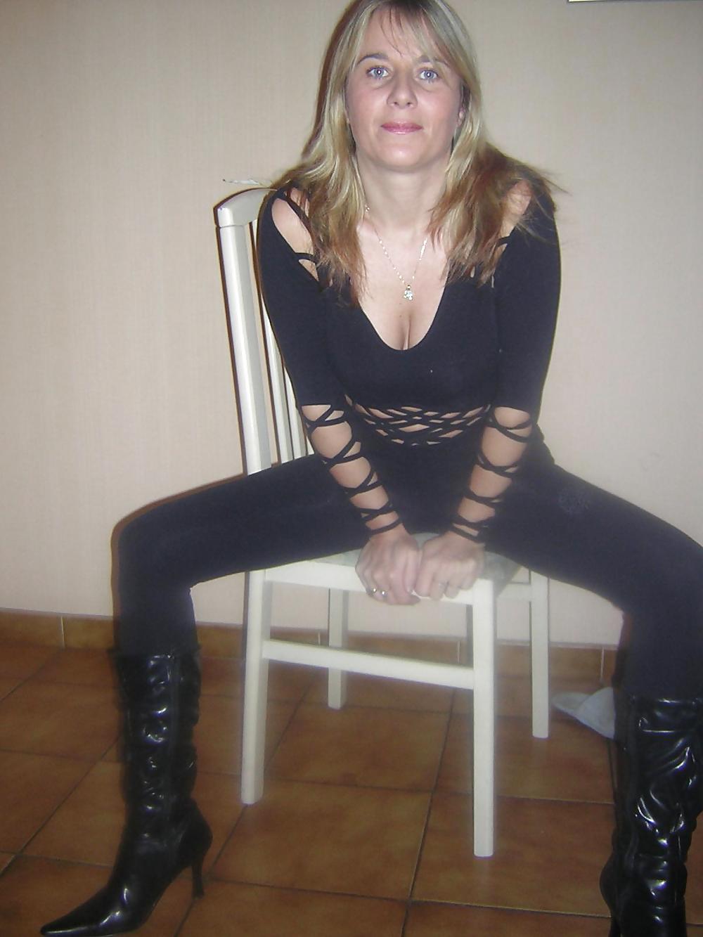 Blonde milf posing for the camera adult photos