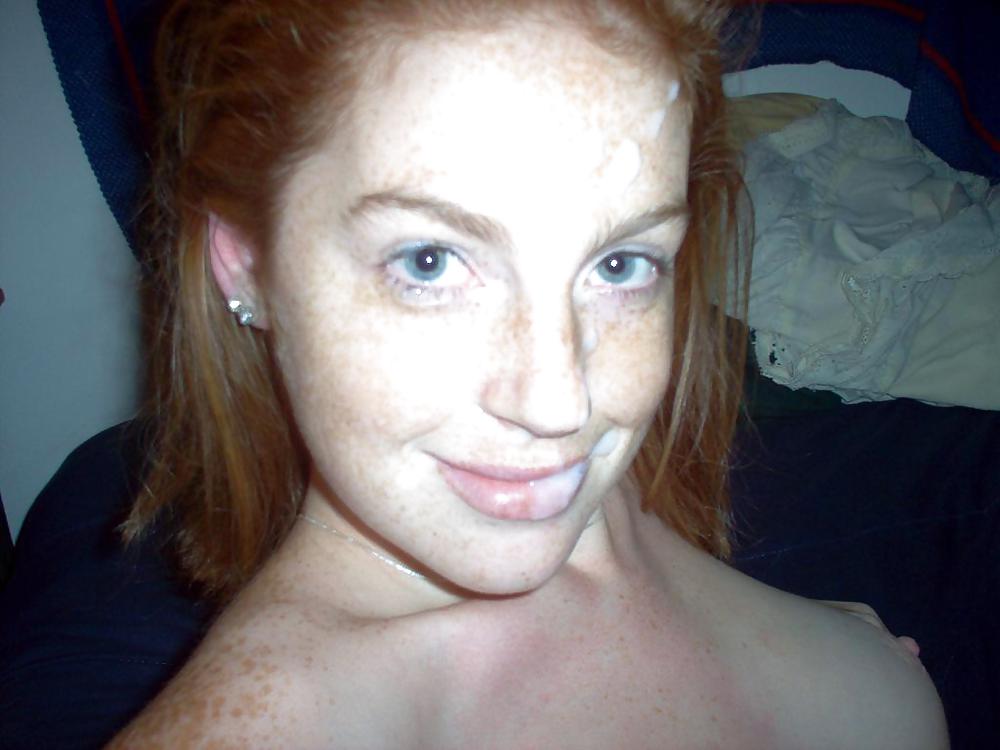 Redhead girl having fun adult photos