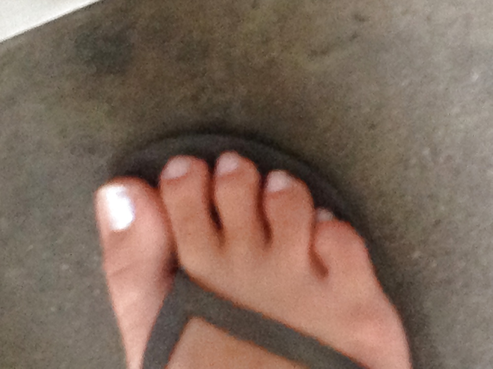 candid asian feet in flip flops adult photos