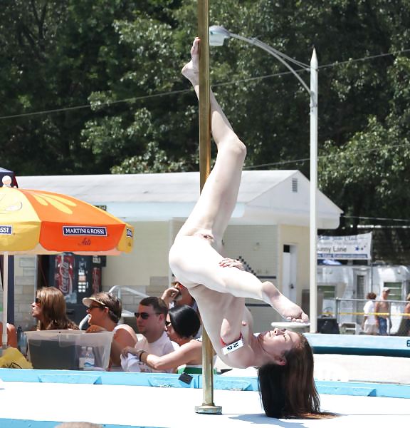 Erotic porn pole dancing in the open air adult photos