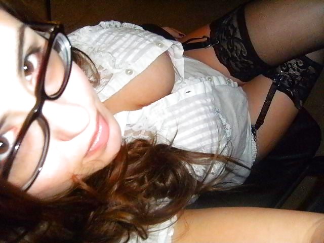 Busty Teen With Glasses From SmutDates.com adult photos