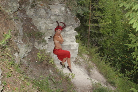forest satyr on the rock         