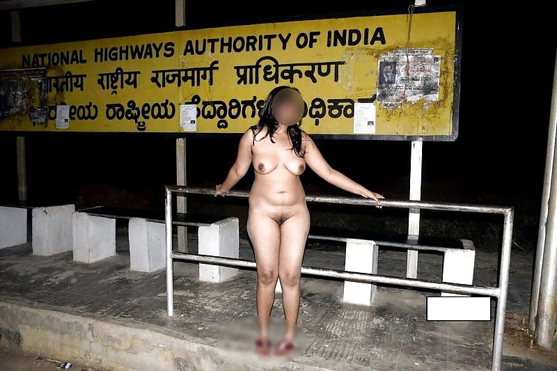 Naughty South Indian wife naked at a bus stop by the highway pics. 