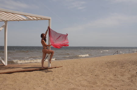 red shawl on windy weather         
