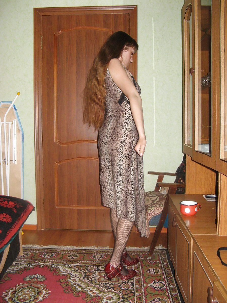 Silly Russian redhead posing and sucking cock adult photos