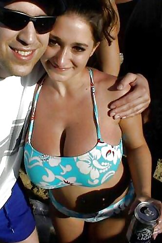 Busty Ashley Strips on College Spring Break adult photos