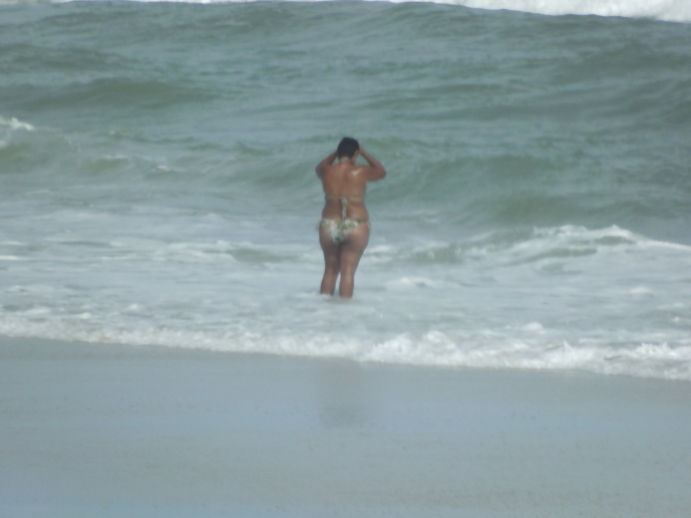 walking in the beach adult photos