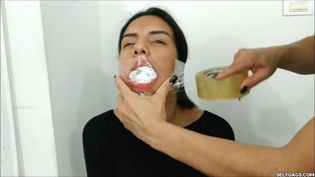 gagged with    socks and clear tape gag selfgags         