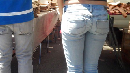 Nice girl in tight ass butt jeans for sure