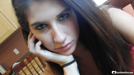 brunette cutie gets some cum over herself         