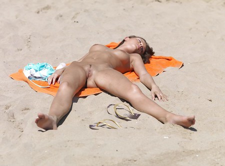 outdoors naked on the beach