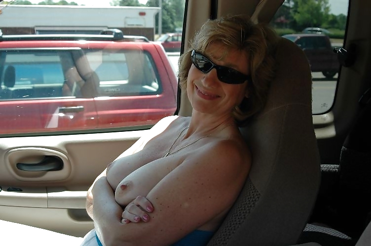 Naked in the car 3. adult photos