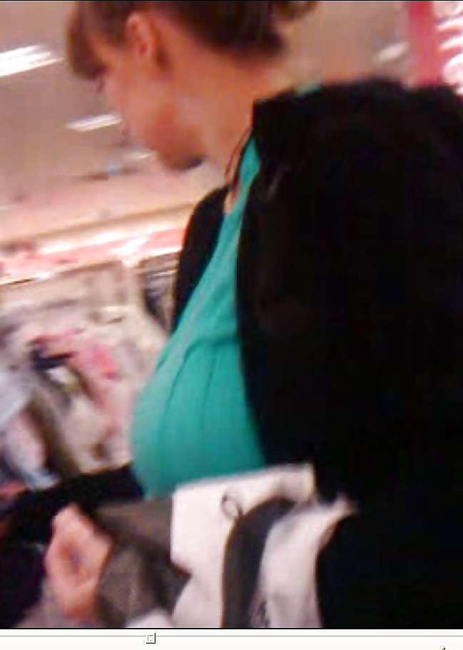Pretty pregnant in supermarket. adult photos