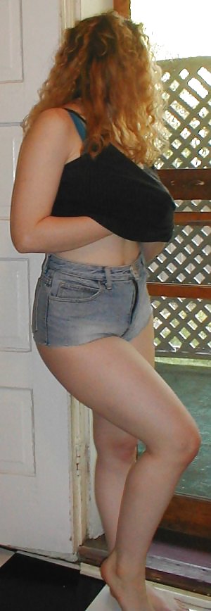 Kira Redhead Amateur Poses In Jean Shorts adult photos