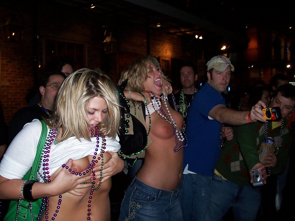 Mardi Gras girls flashing their boobs adult photos