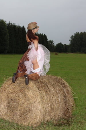 rainy day in meadow and woman         