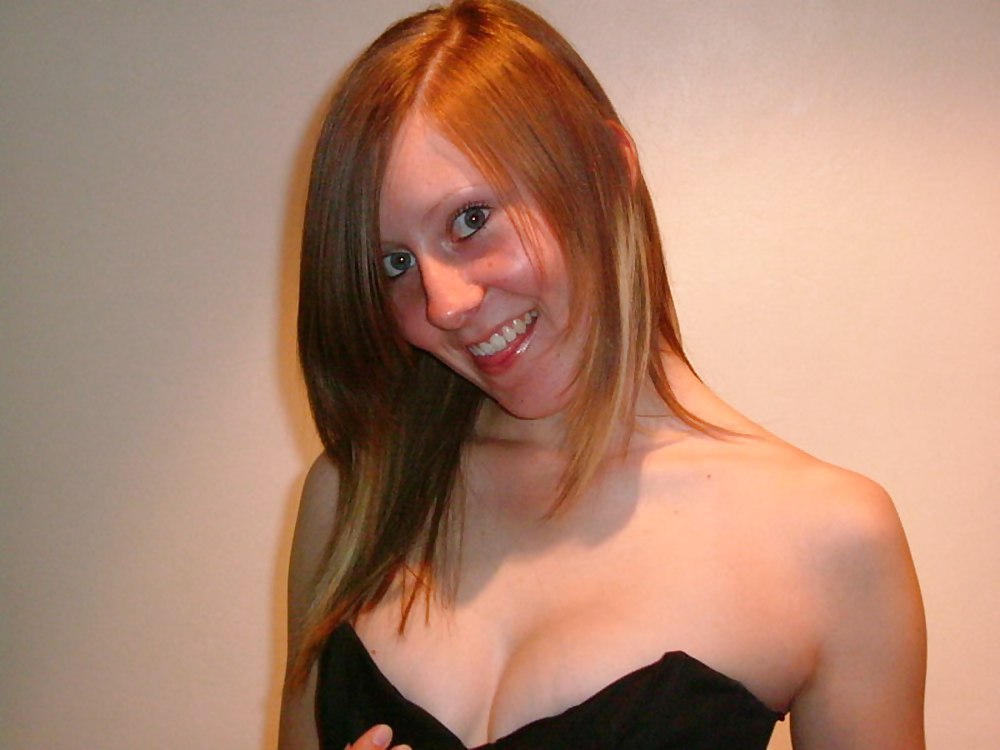 Redhead with perky tits and a rose - N. C. adult photos