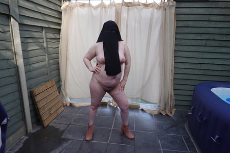 nude in niqab in ankle boots         