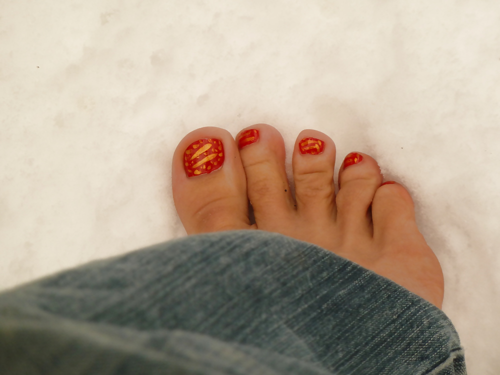 feet in snow adult photos