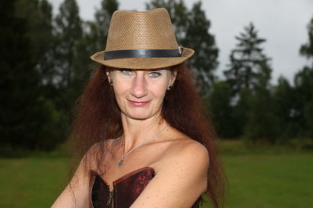 rainy day in meadow and woman         