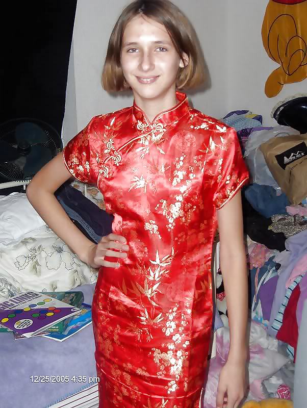 Single Western girl in Satin Cheongsam adult photos